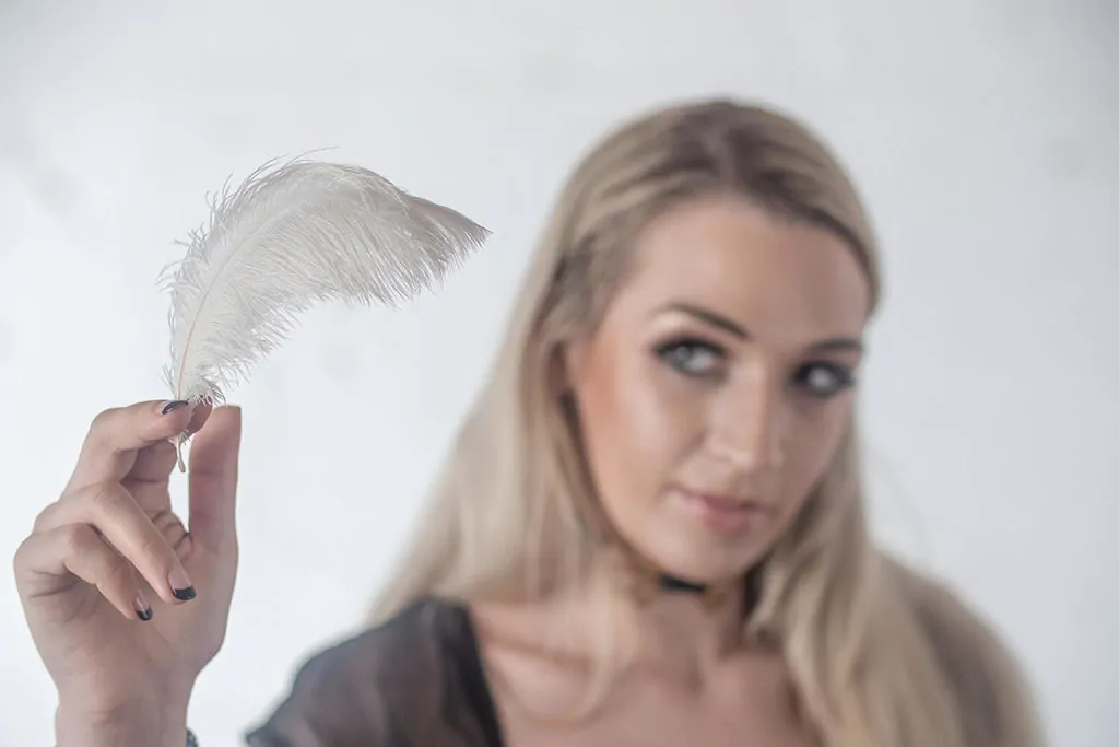 Seattle tickling Fetish dominatrix Ruby holds a feather